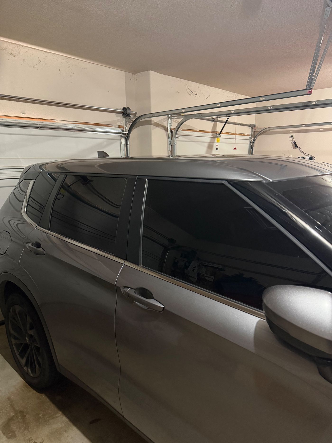 Gray SUV with freshly installed ceramic window tint