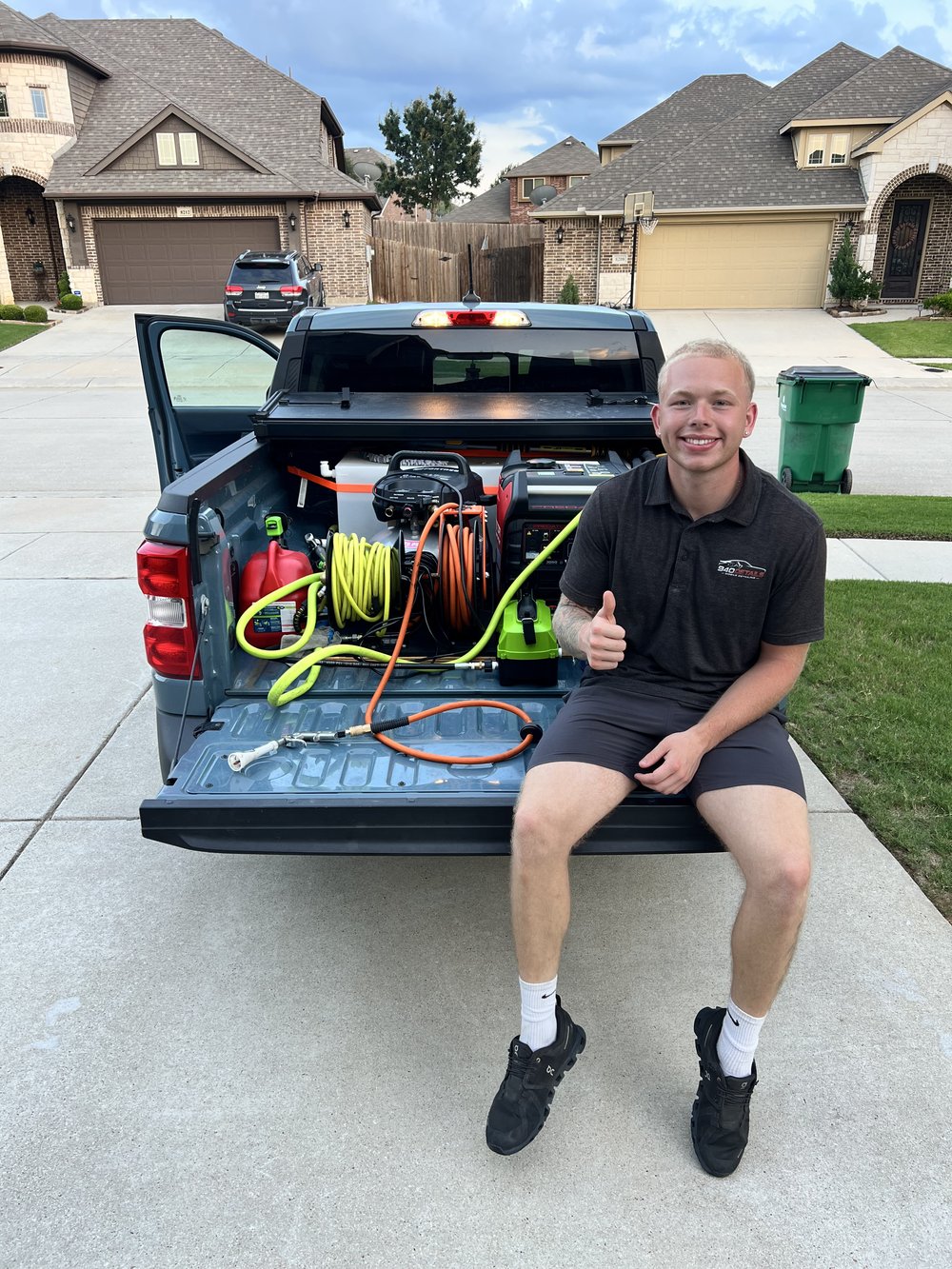 Gage, owner of 940 Details, with his mobile detailing van